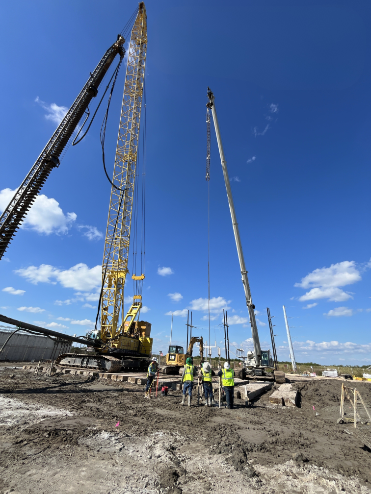 Auger piles being installed within substation yard on an island