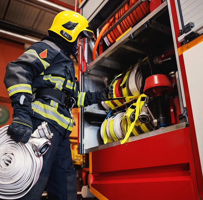 Fireman with fire equipment