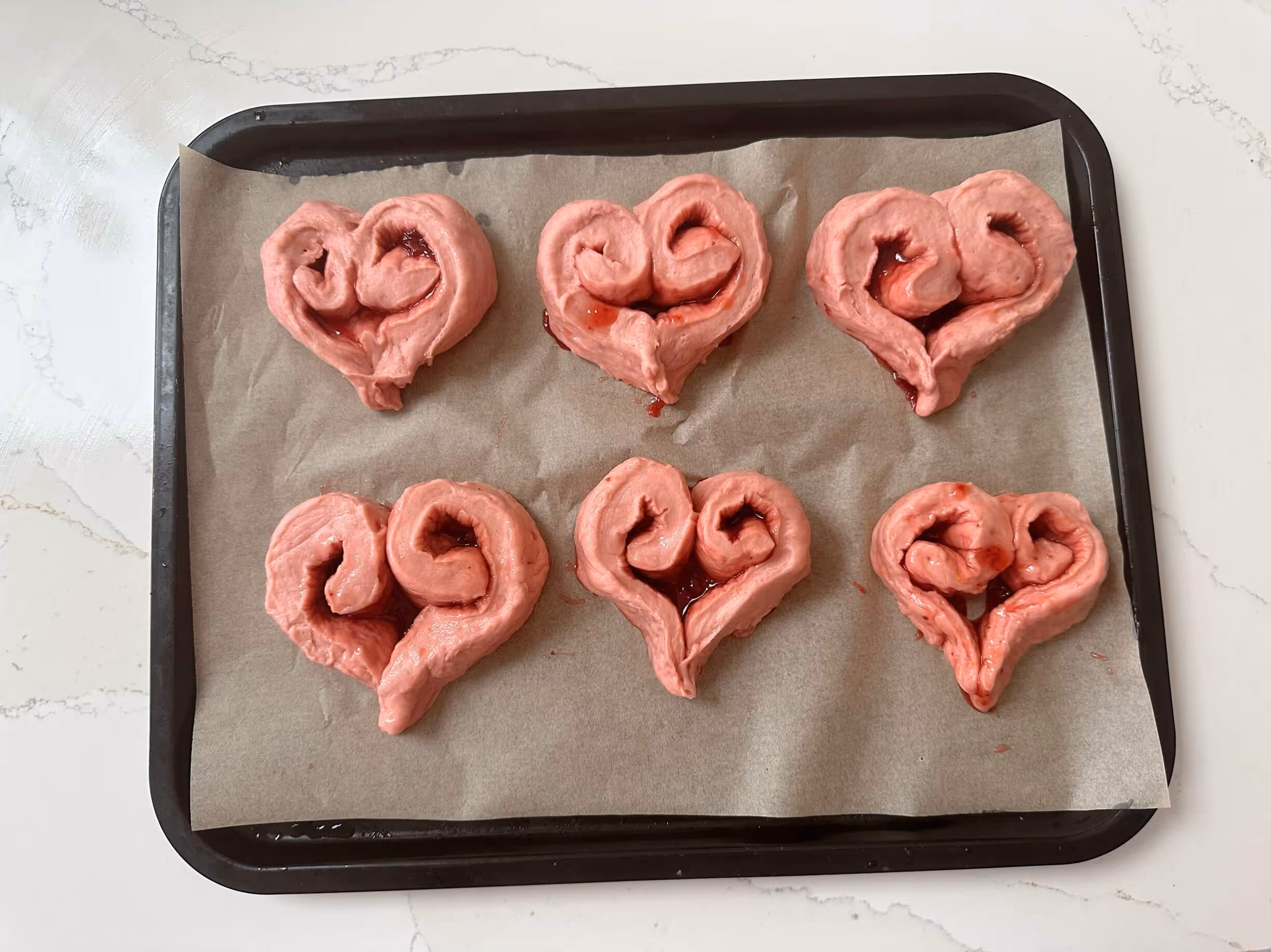 Pink Vegan Love Heart Shaped Buns Pre Baked Buns On Baking Tray