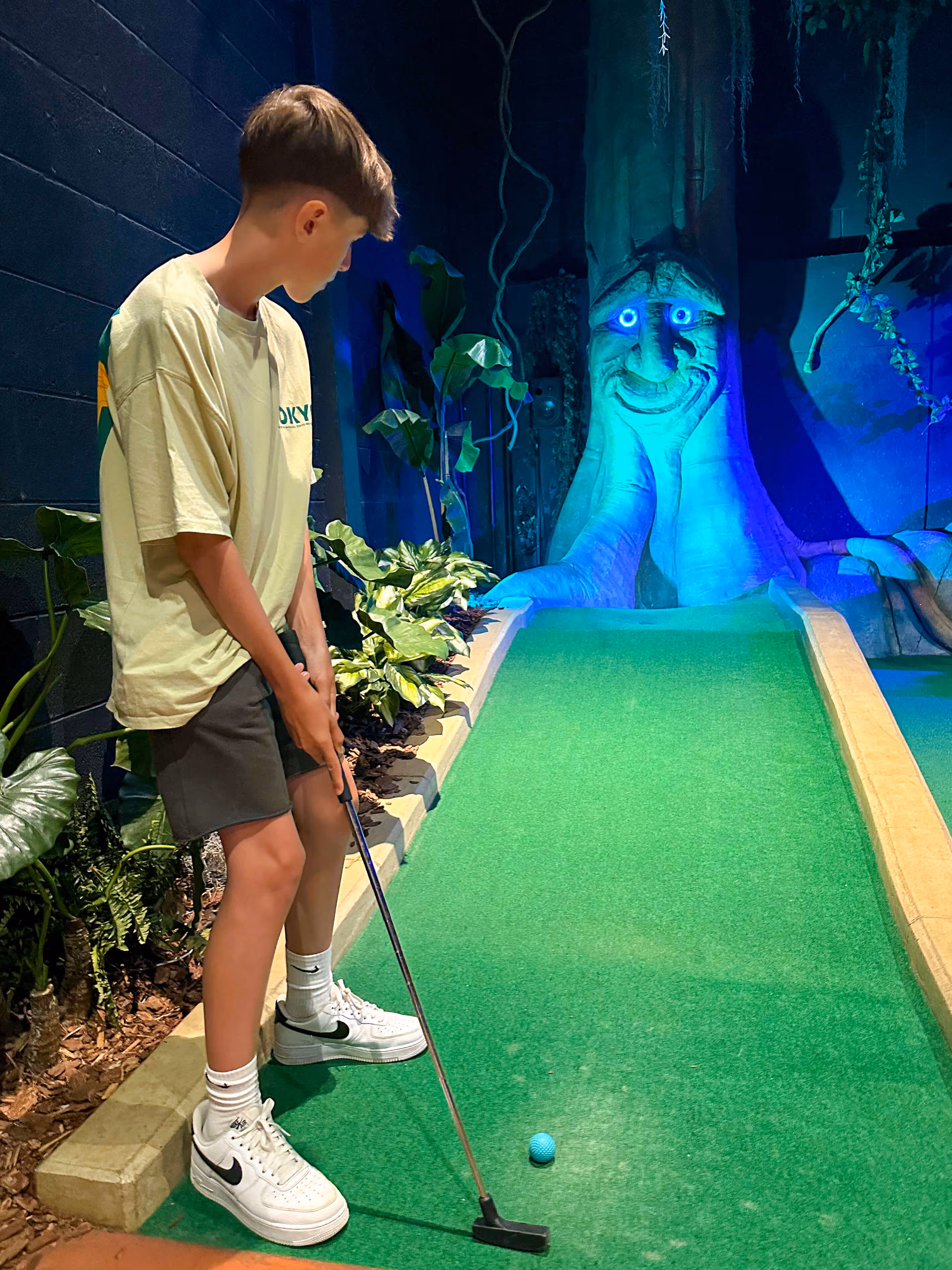 Excited kids taking their shots on the Mystic Woods course