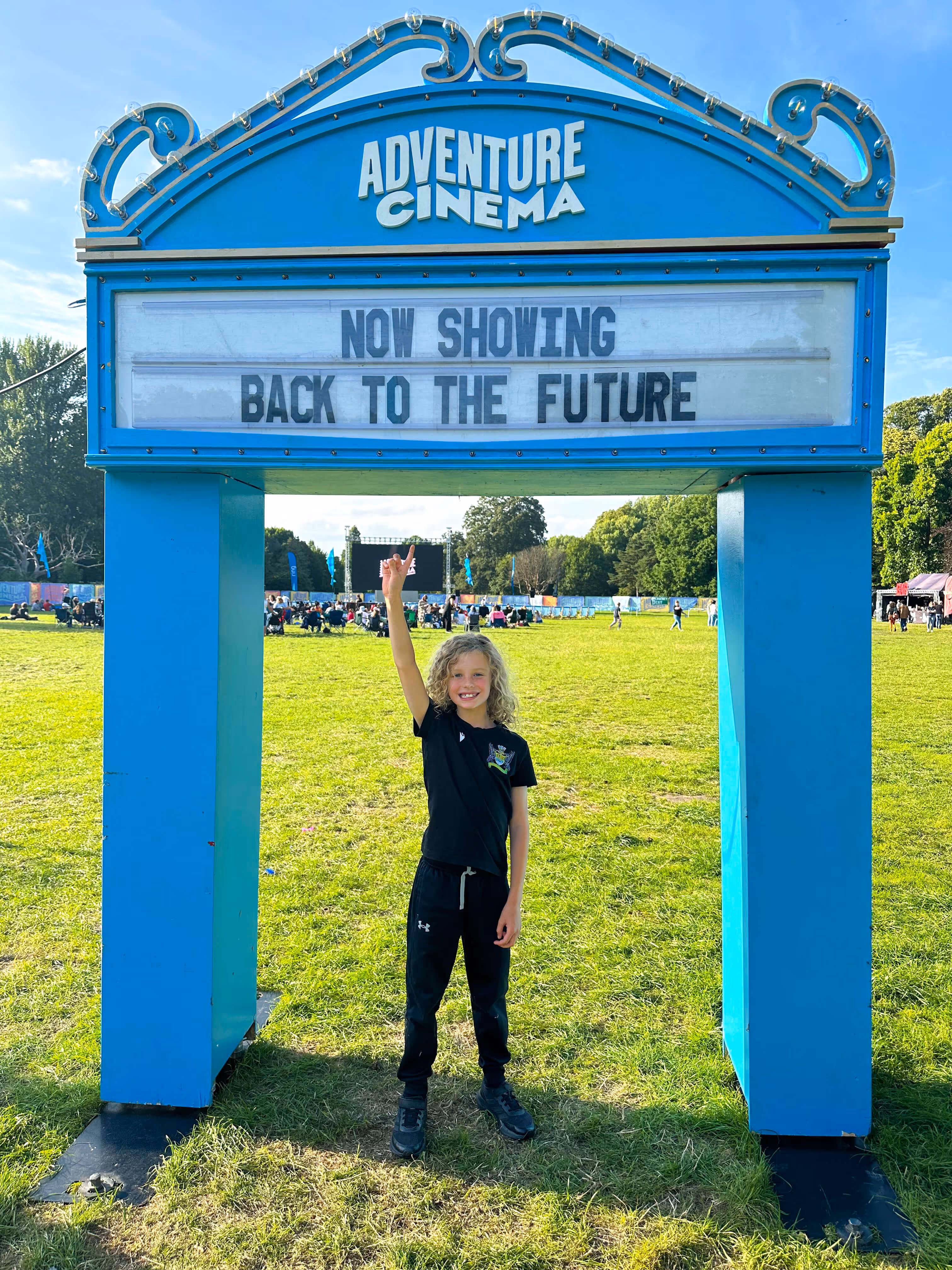 Families enjoying a film under the stars at Adventure Cinema's event in Cardiff's Bute Park