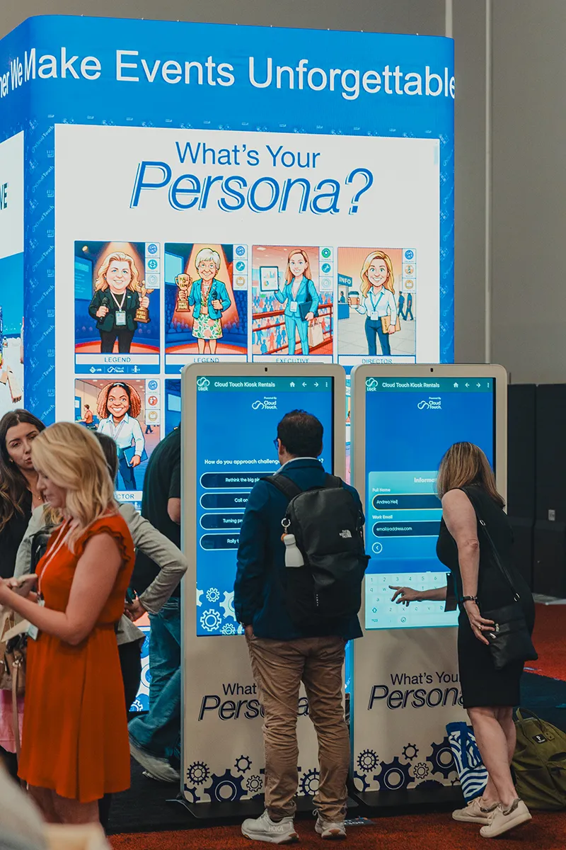 attendees engaging with the photo booth via digital kiosk
