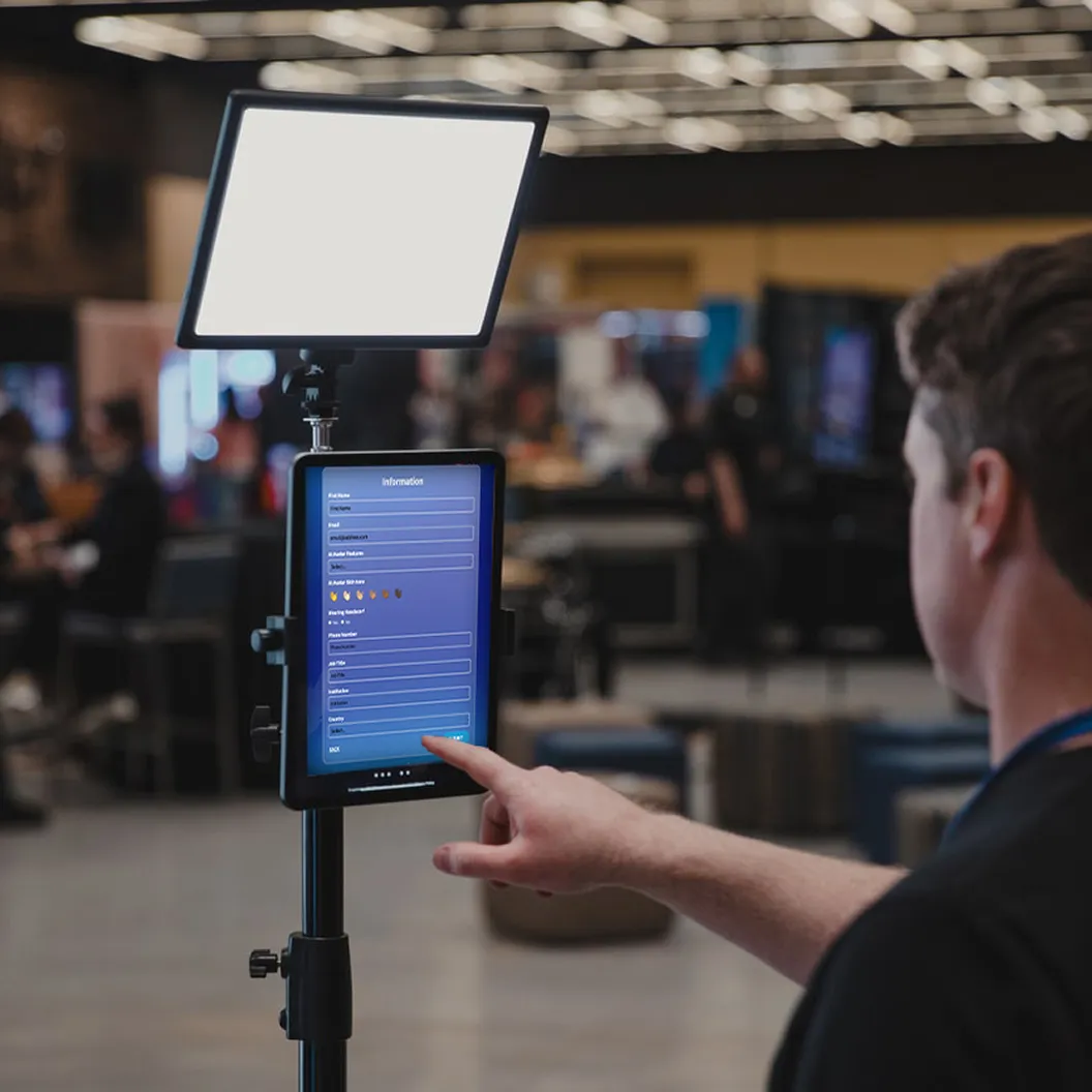 in-person event attendee using a photo booth experience