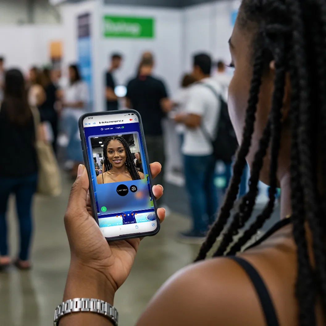 event attendee using experience on their own mobile phone