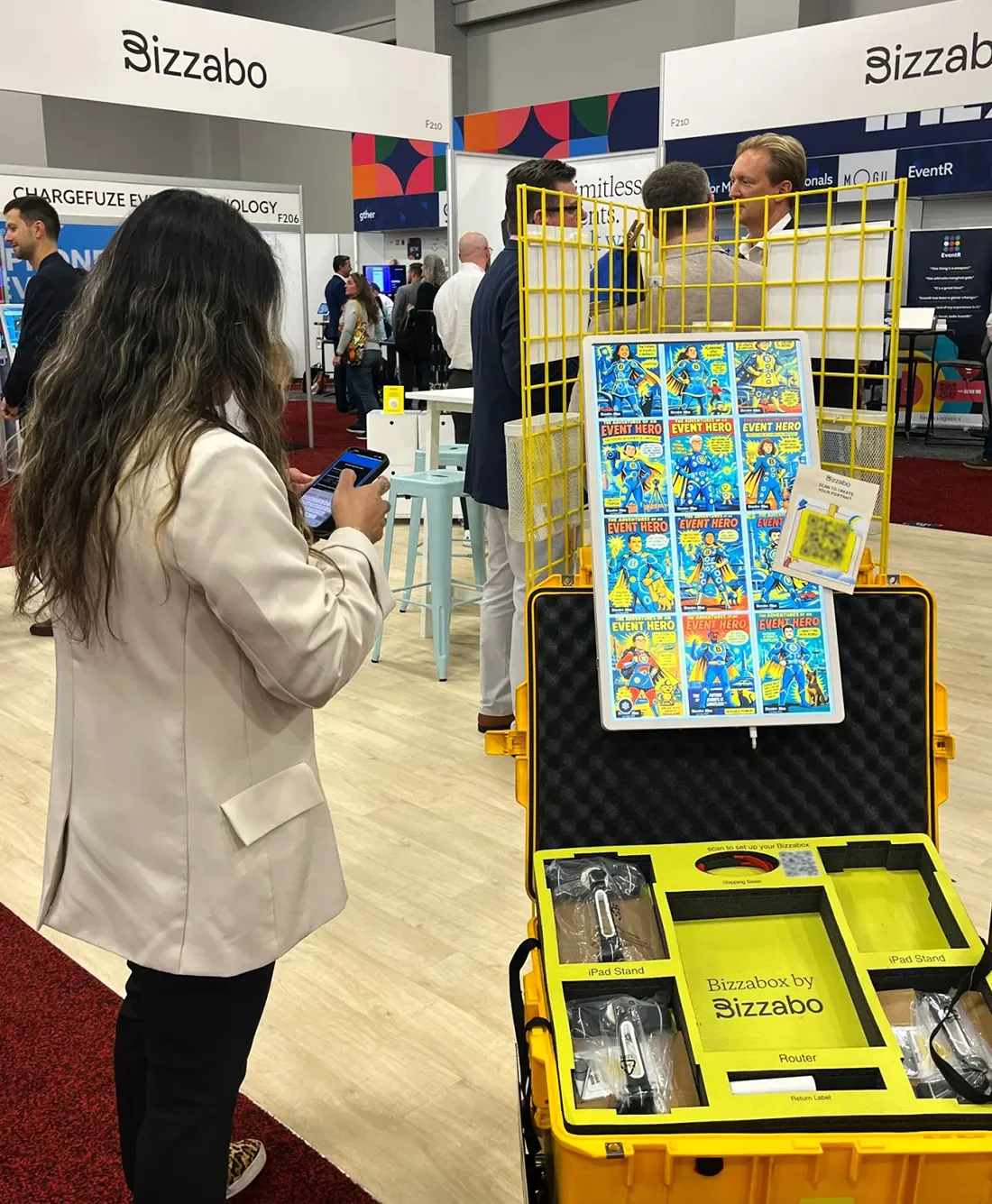 woman using her phone to scan a qr code to access the ai photo booth