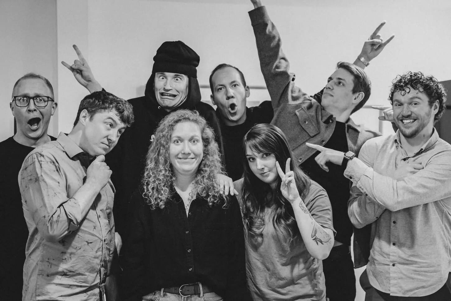 The Snapbar team making goofy faces and rock-on hand gestures