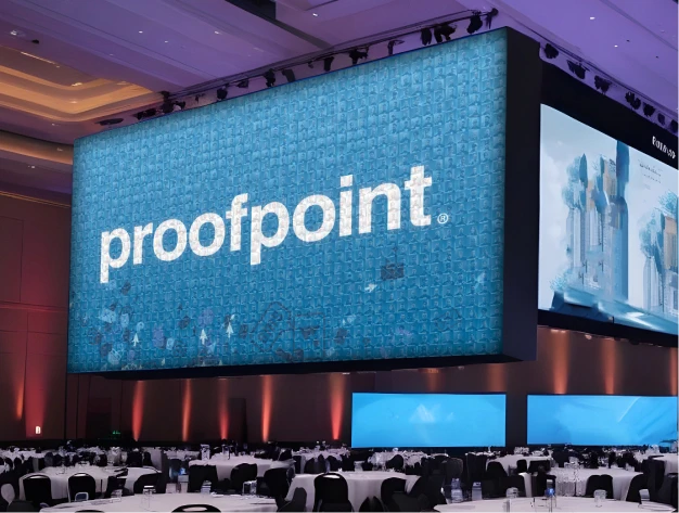 Live mosaic wall displaying real-time community participation at corporate event