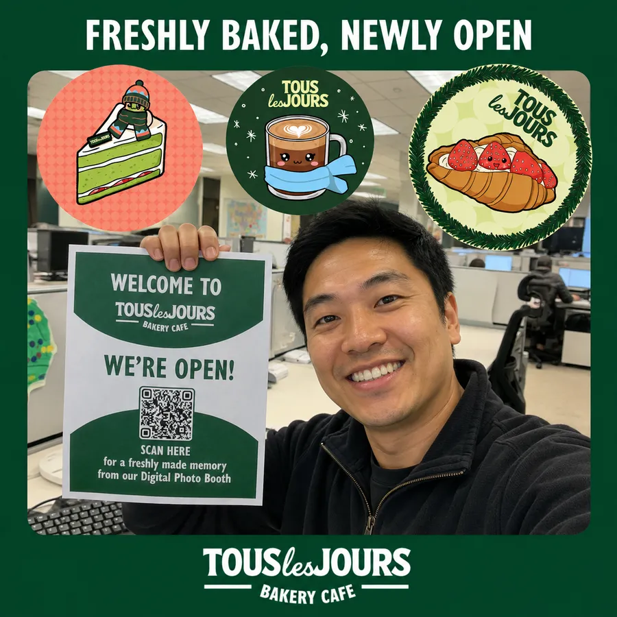 Photo booth snapshot of a guest holding a We're Open sign on a Tous les Jours bakery cafe frame