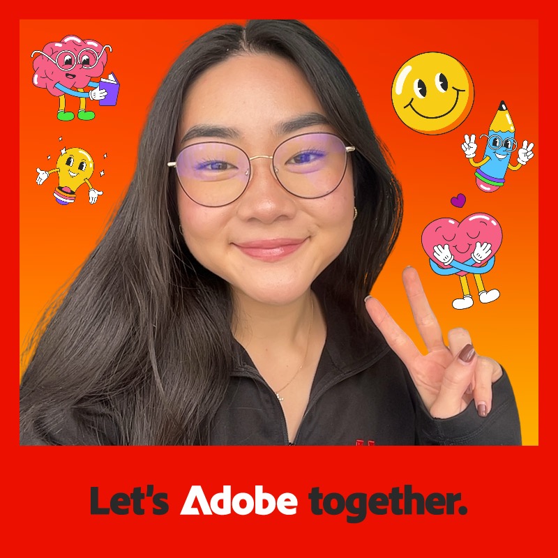 Photo booth snapshot of a guest flashing a peace sign on a Let's Adobe Together sticker frame