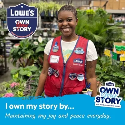 Photo booth snapshot of a Lowe's associate in a red vest on an Own Your Story leadership summit frame