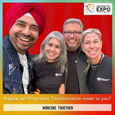 Photo booth snapshot of four teammates on a Growth Expo frame asking What does Transformation mean to you