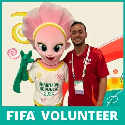 Photo booth snapshot of a FIFA volunteer posing with a flower mascot on a Dominican Republic 2024 frame