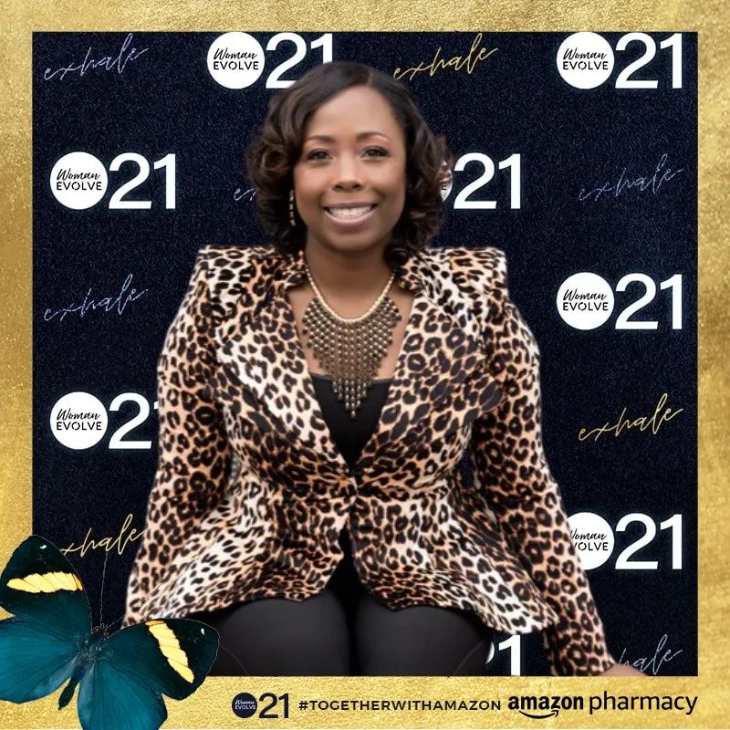 Photo booth snapshot of a guest in a leopard blazer on a Woman Evolve 21 frame with Amazon Pharmacy branding