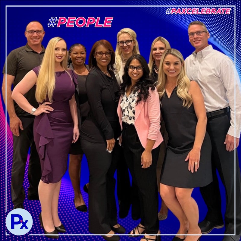 Photo booth snapshot of nine teammates on a Pax Celebrate frame with a People hashtag