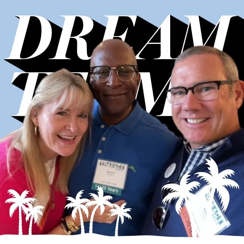 Photo booth snapshot of three colleagues on a Dream Team frame with white palm tree accents