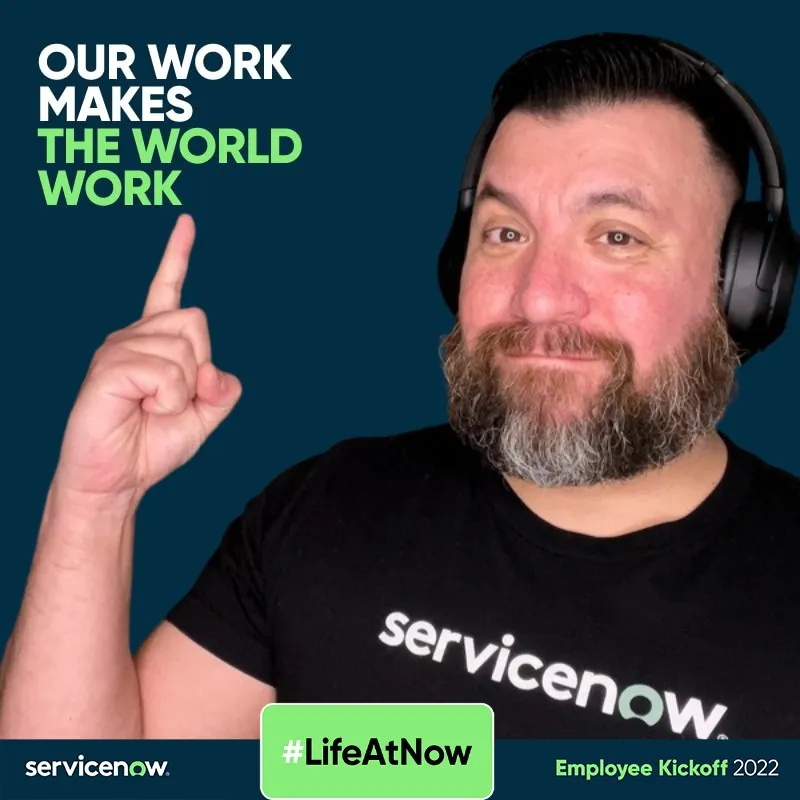 Photo booth snapshot of a guest in headphones pointing up on a ServiceNow Our Work Makes the World Work frame