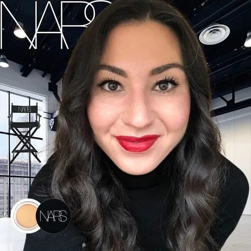 Photo booth snapshot of a guest with red lipstick on a NARS studio frame