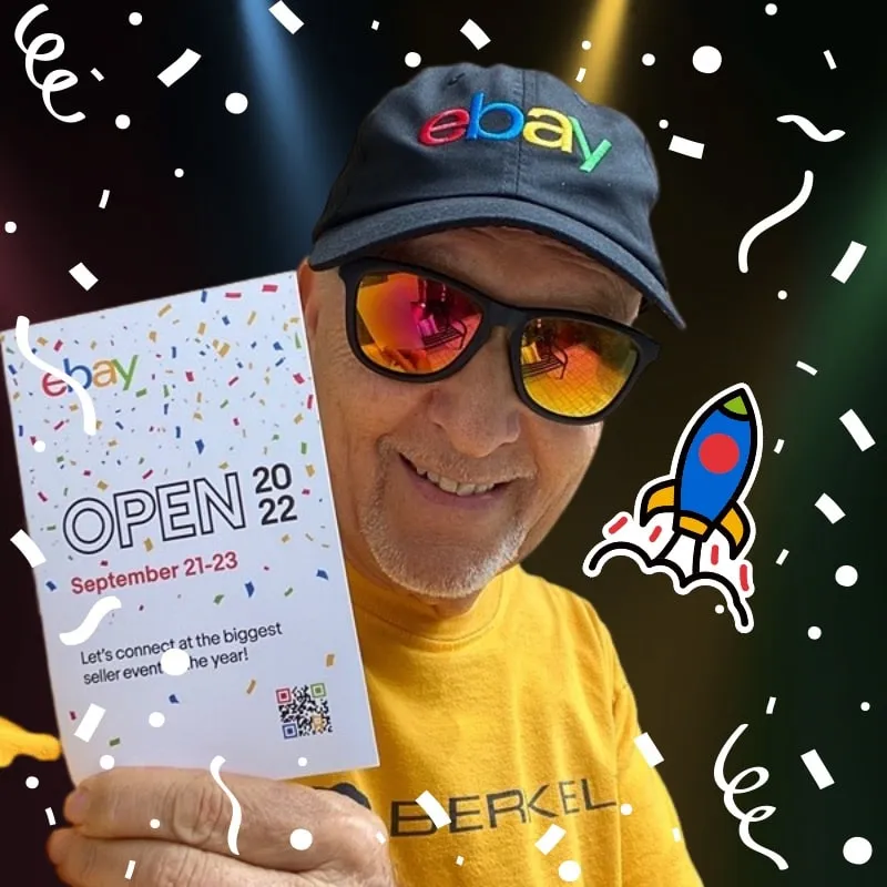 Photo booth snapshot of a fan in an eBay cap holding an eBay Open 2022 flyer on a confetti frame