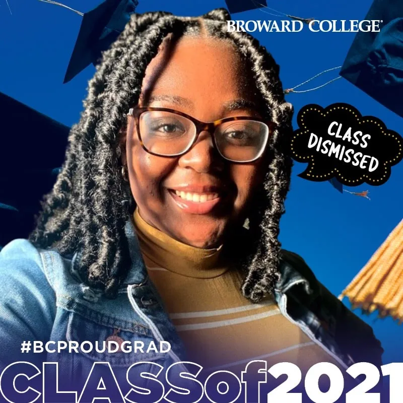 Photo booth snapshot of a graduate on a Broward College Class of 2021 frame reading class dismissed