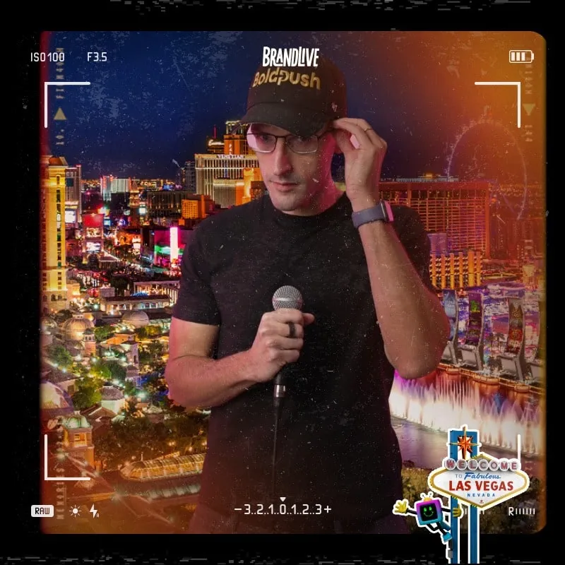 Photo booth snapshot of a guest holding a microphone over the Las Vegas strip on a Brandlive film frame