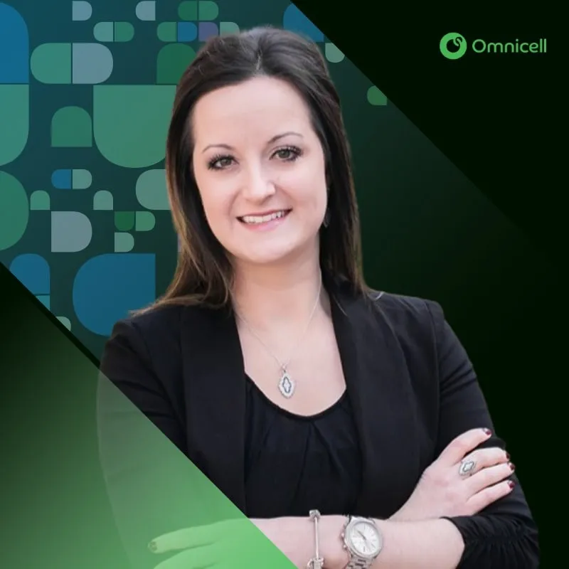 Photo booth snapshot of a guest with crossed arms on a green Omnicell frame