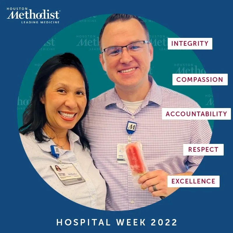 Photo booth snapshot of two guests on a Houston Methodist Hospital Week 2022 frame listing core values