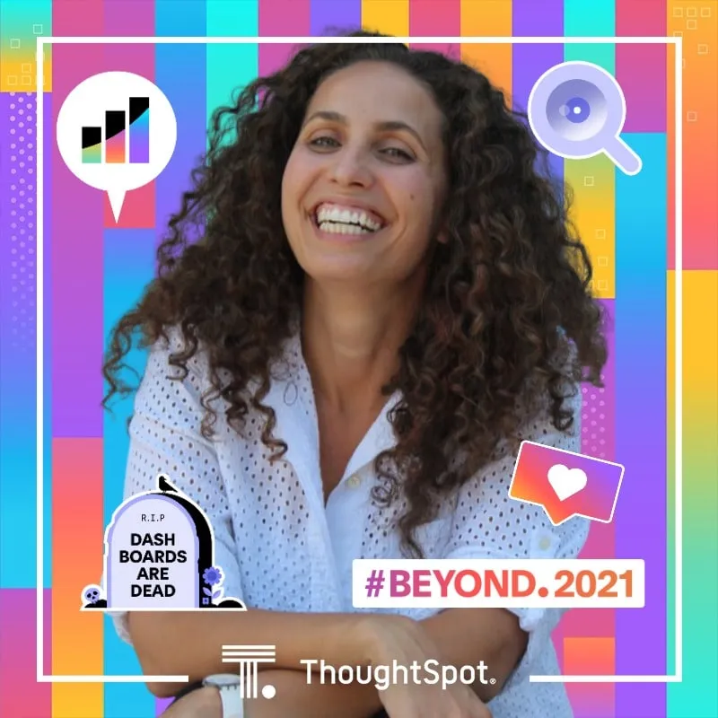 Photo booth snapshot of a guest on a colorful ThoughtSpot Beyond 2021 frame with a dashboards are dead sticker