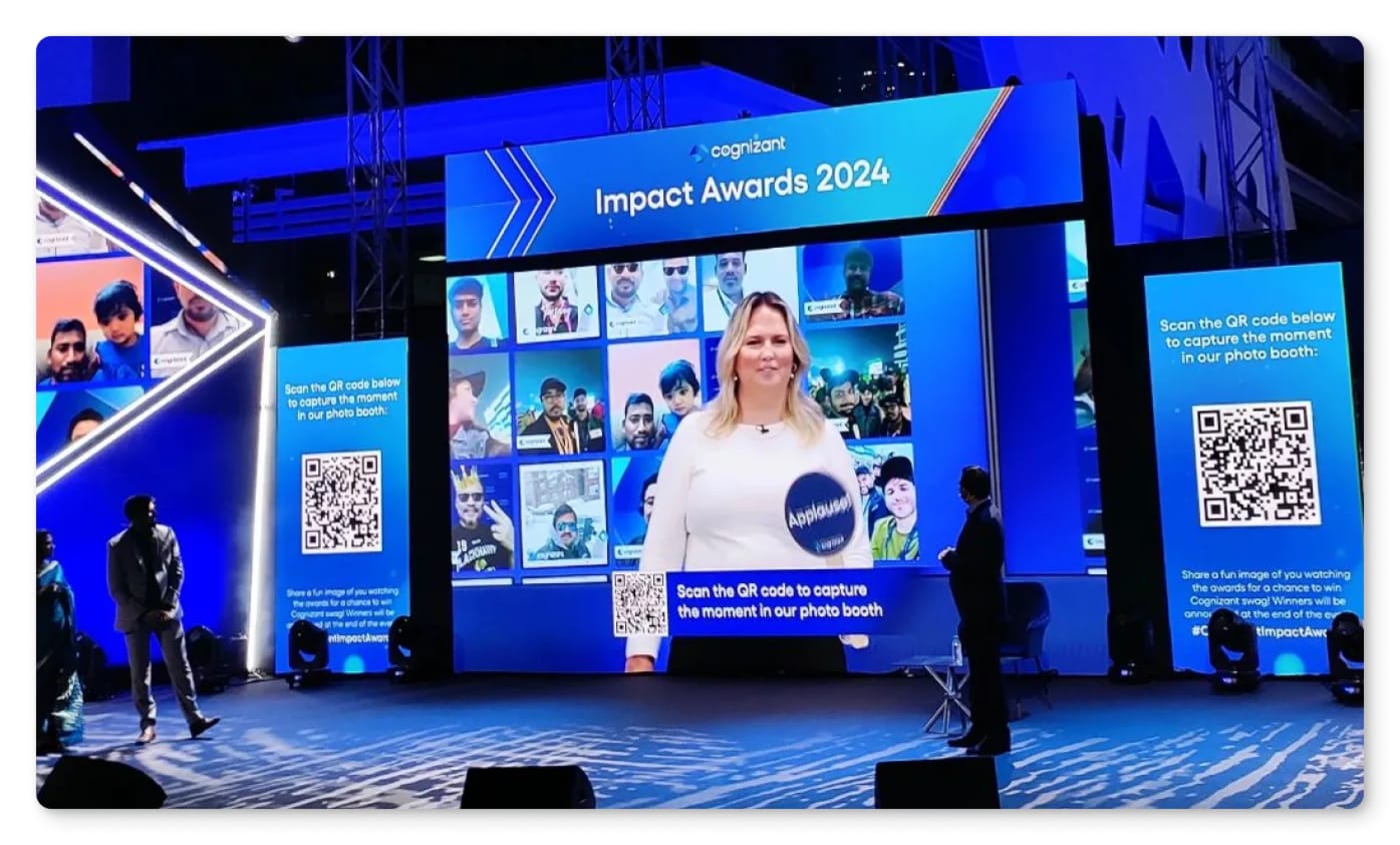 A live gallery of guest content on a screen beside a corporate activation.