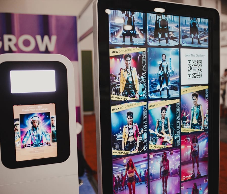 Touchscreen kiosk beside a tall display showing a live gallery of AI portraits and a QR code to join the gallery