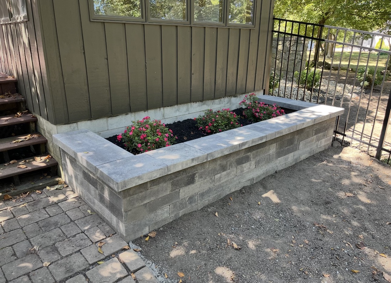 Retaining wall used for raised flower beds landscaping.