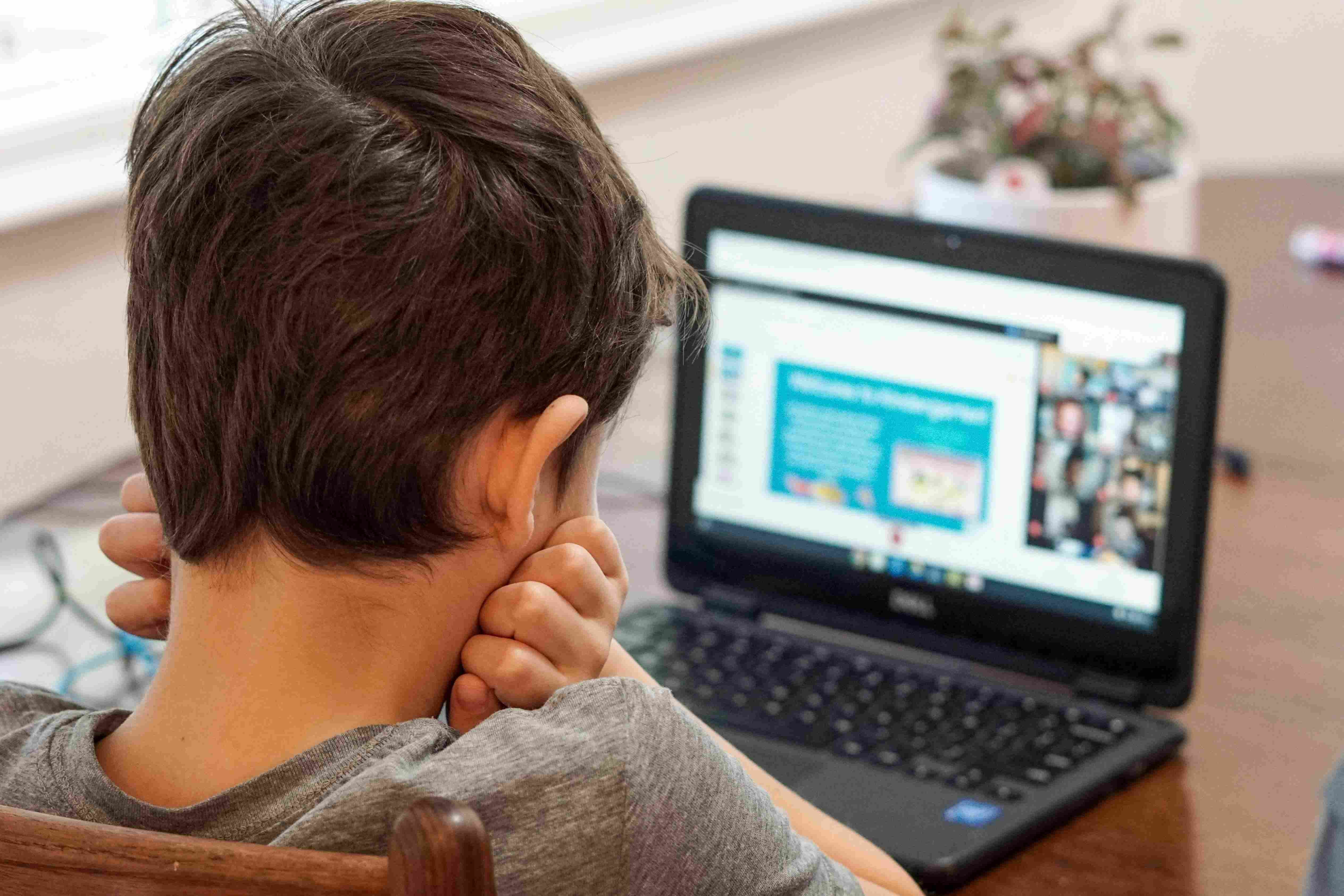 Boy Fixing Computer