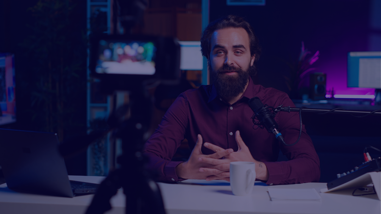B2B content creator on camera in a video studio, illustrating LinkedIn post formats