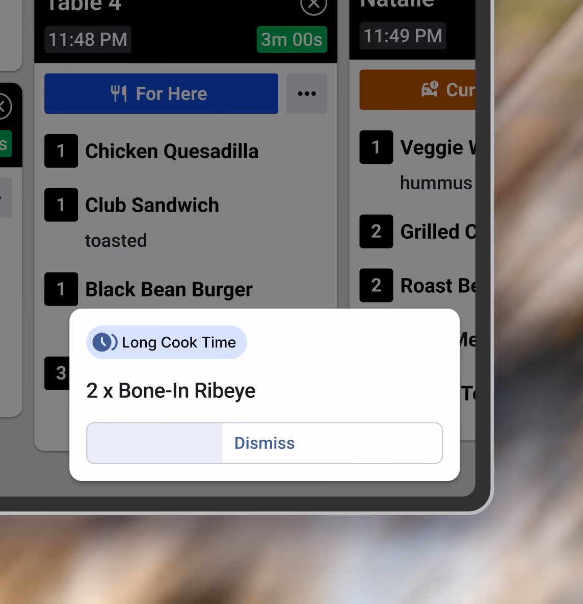 A Long Cook Time alert on a Fresh KDS screen for 2 x Bone-In Ribeye, with a Dismiss button that counts down
