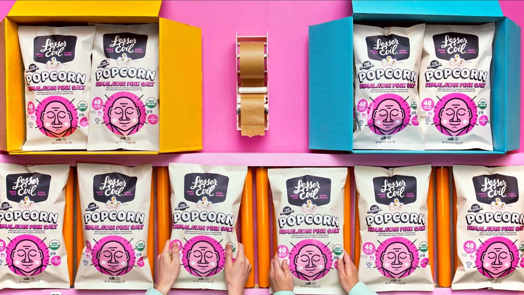 Custom-built tabletop set featuring Lesser Evil Himalayan Pink Salt popcorn bags, designed and styled by Big River Film Co. to align with the brand’s bold, colorful aesthetic for food and beverage video production.