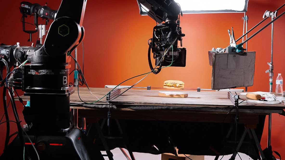 Bolt high-speed robotic camera arm capturing cinematic tabletop footage of a sub sandwich on set, showcasing Big River Film Co.’s precision motion control and slow-motion video production for food and beverage brands.