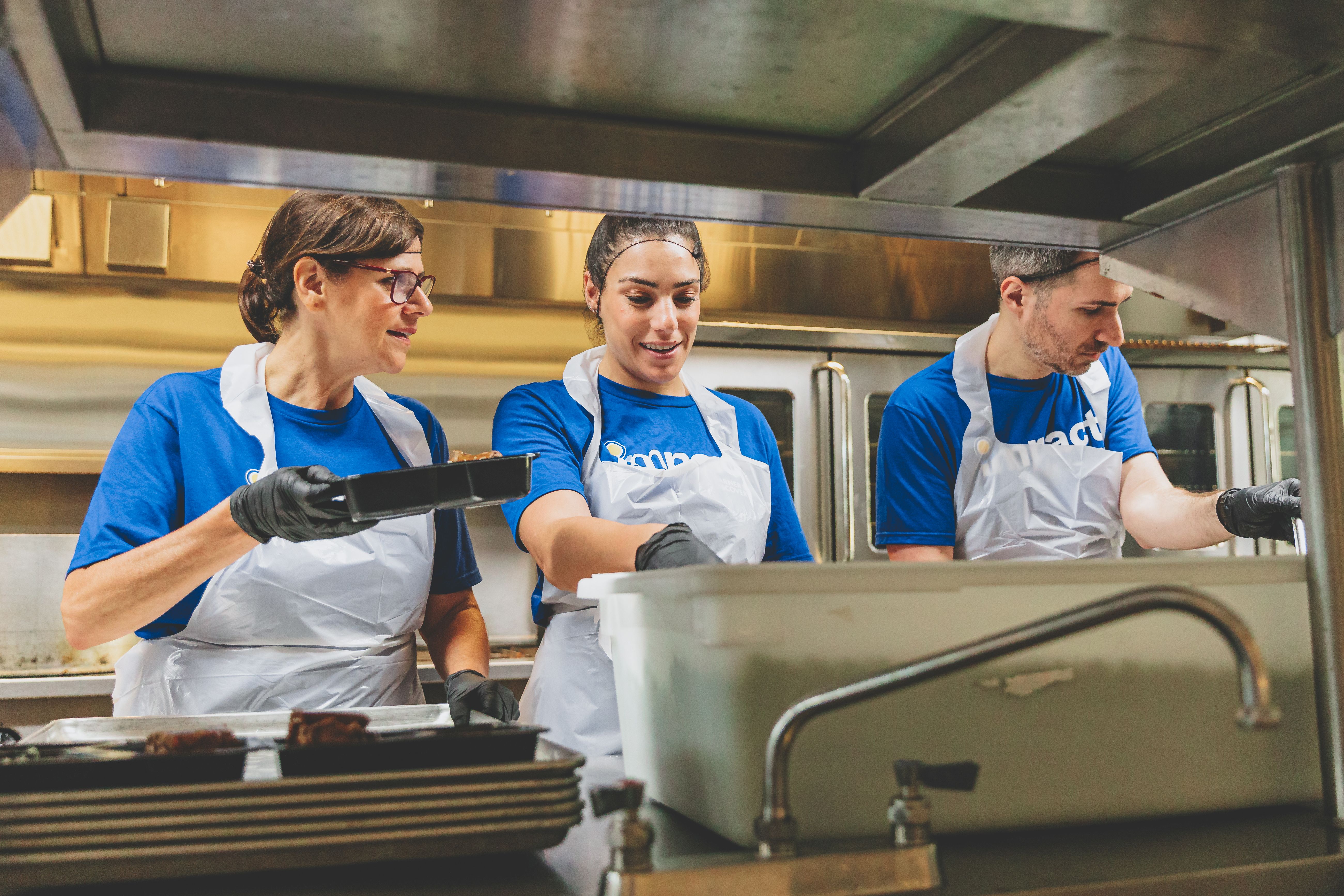 Chefs preparing medically tailored meals in the Project Angel Food kitchen