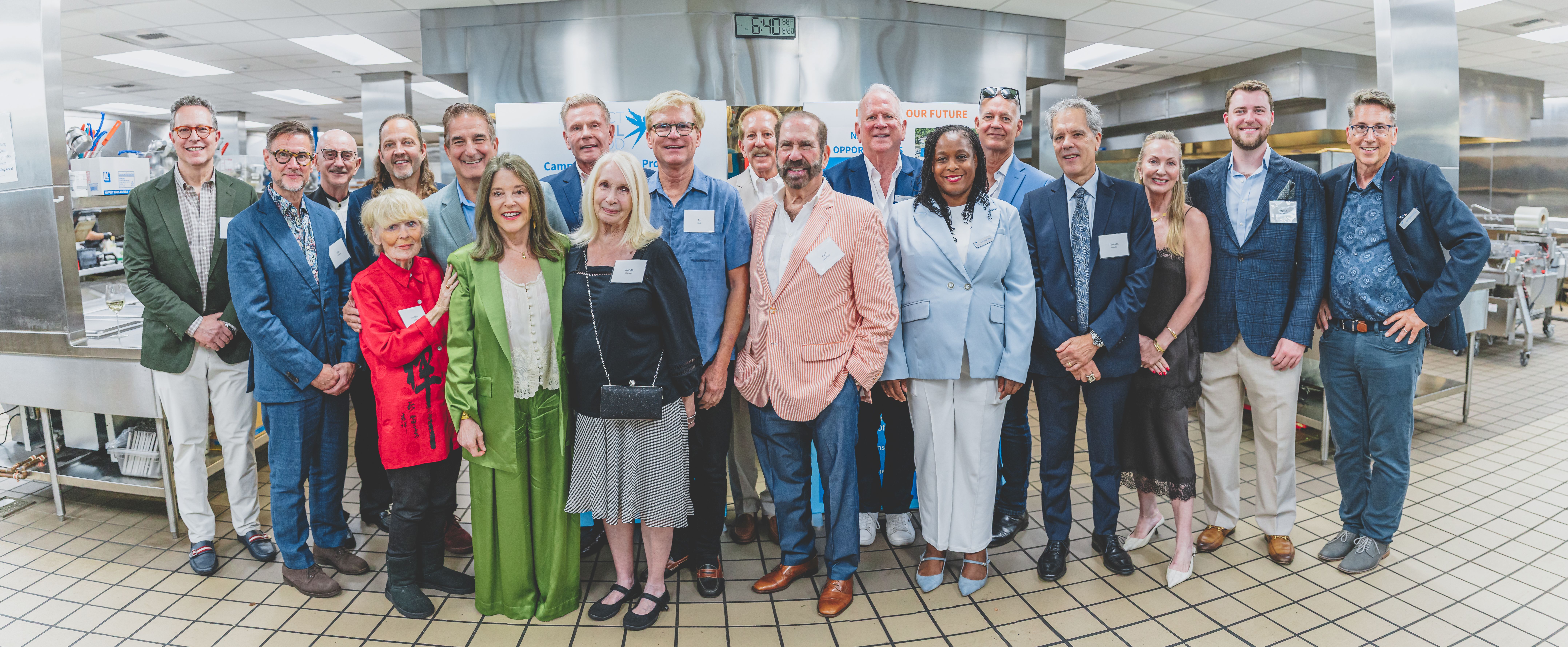 Guests raising glasses at Project Angel Food's Chef's Dinner