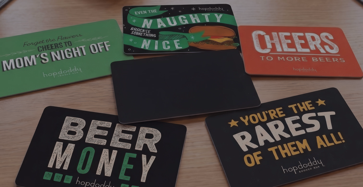 Set of six Hopdoddy gift cards with humorous phrases about beer and fun occasions.