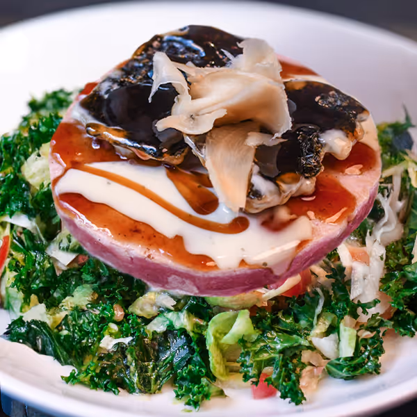 Ahi Tuna Burger over a bed of tossed greens