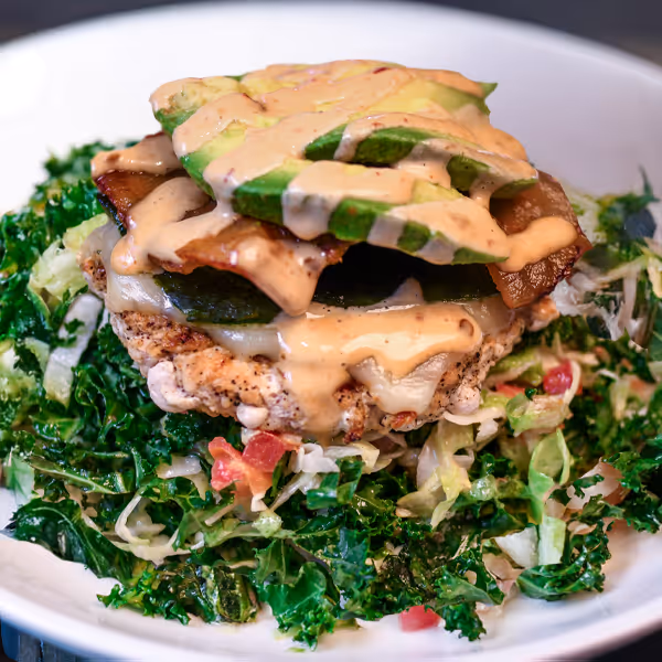 Thunderbird burger over a bed of tossed greens
