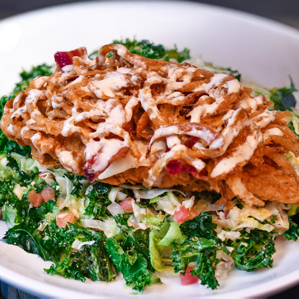 Crispy Chicken Bacon Ranch Sandwich of tossed house greens