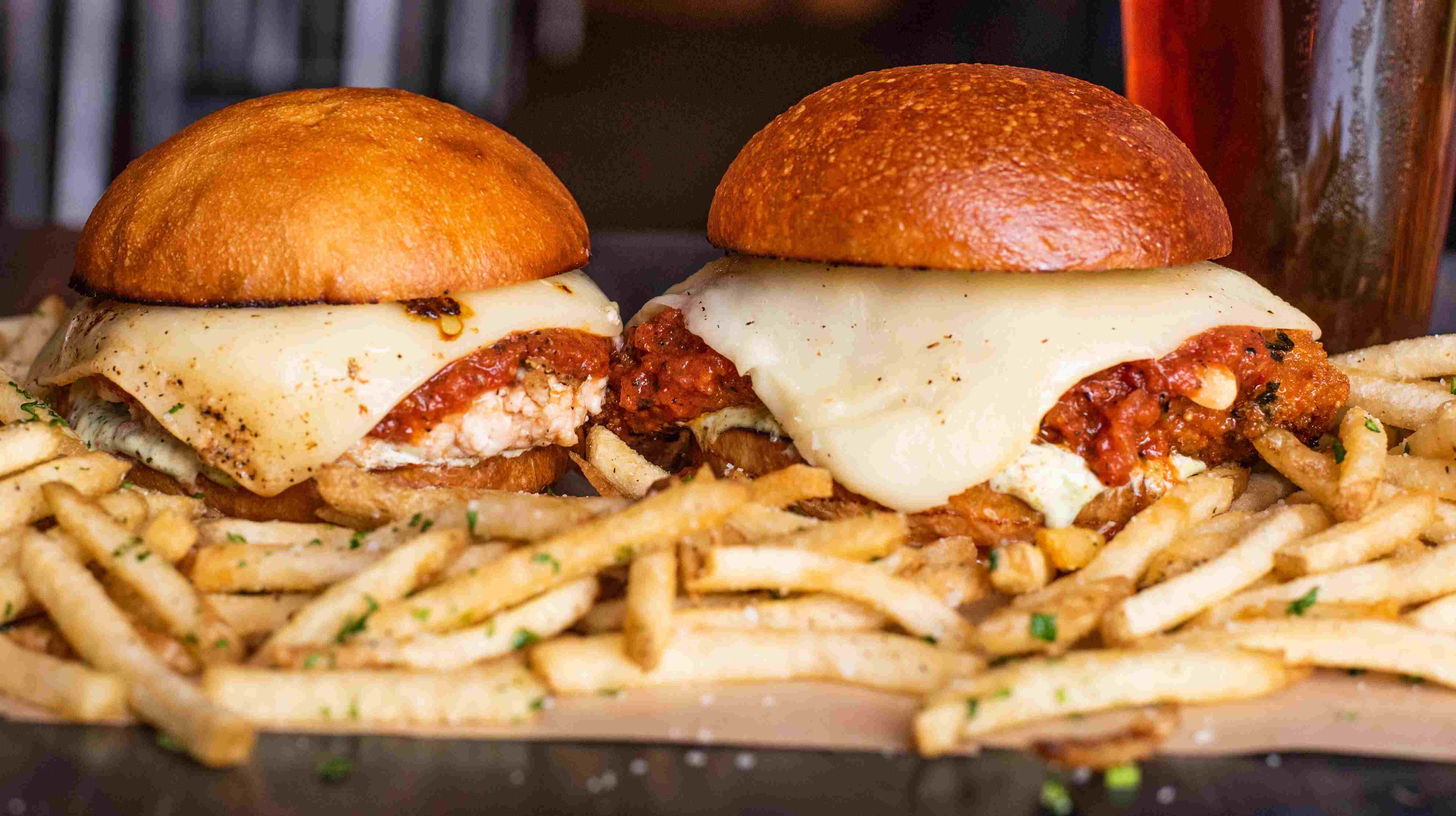 The grilled and fried chicken parmesan sandwiches