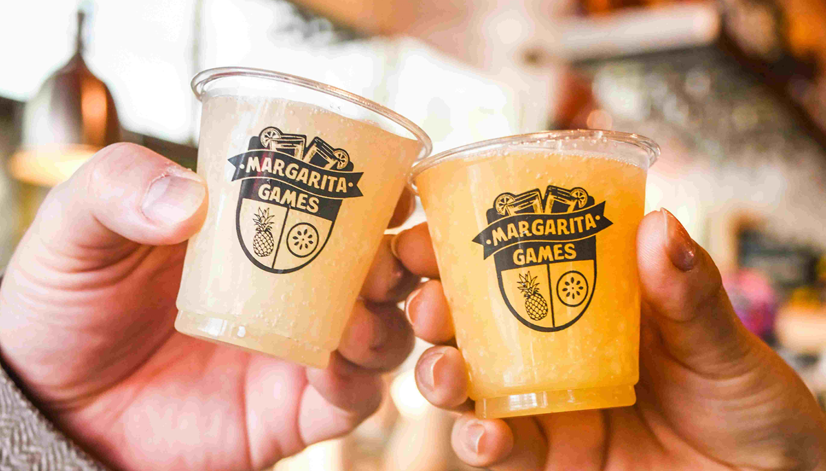 hands holding margaritas