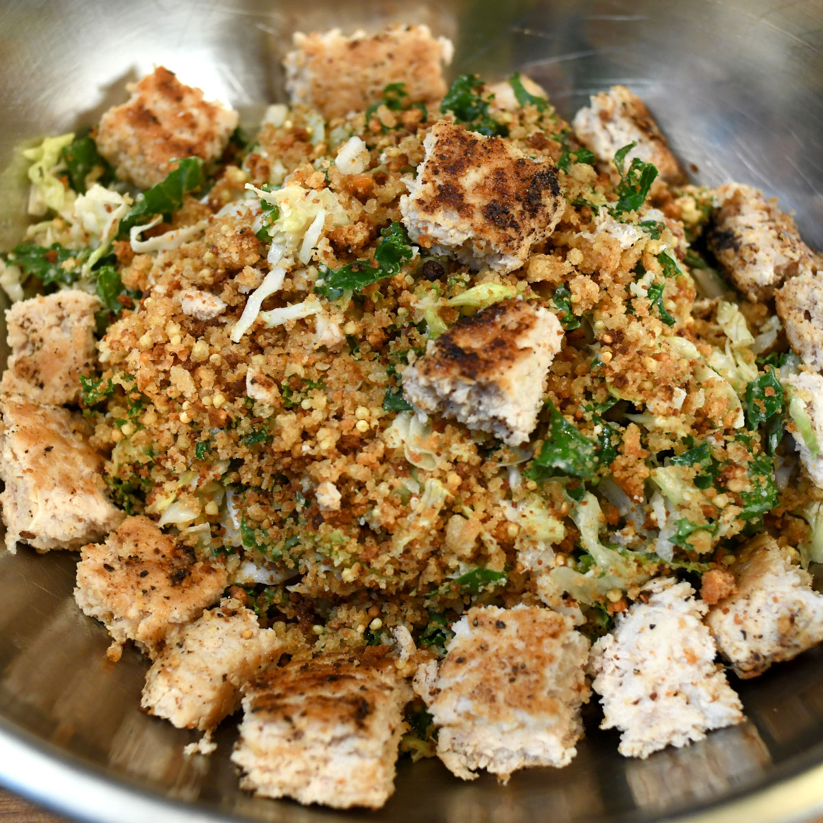 House greens tossed in creamy caesar dressing, topped with shaved parmesan & magic crouton dust