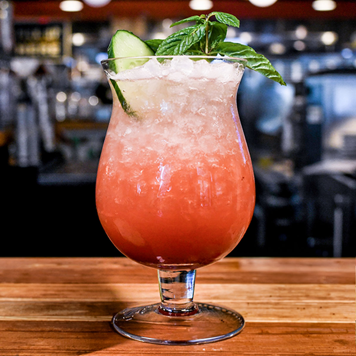 Non-boozy refresher featuring strawberry puree, cucumber, mint, lime juice & agave