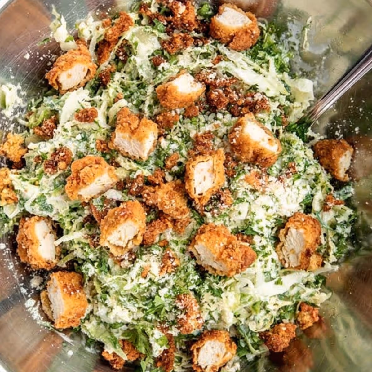 House greens tossed in creamy caesar dressing, topped with shaved parmesan & magic crouton dust