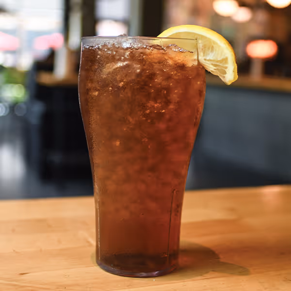 Iced tea with lemon slice.