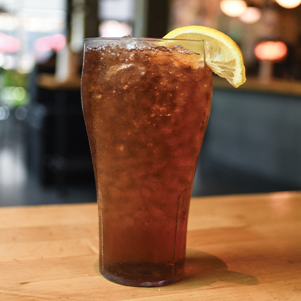 Iced tea with lemon slice.