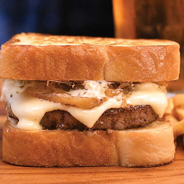 Beef patty smothered with swiss & american cheese, caramelized onions, mayo & comeback sauce on grilled Texas Toast