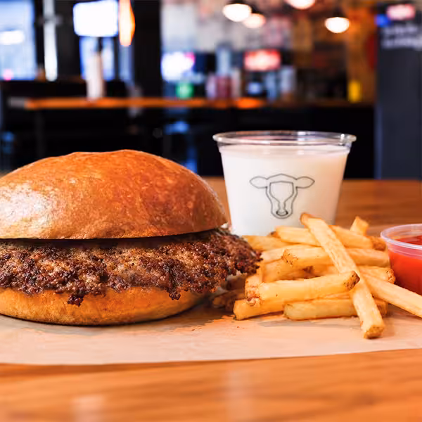 Beef smash patty with ketchup. Includes hand-cut fries & your choice of kid's drink.